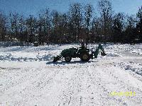 Cleaning off the pond at the Mud Hole 2011