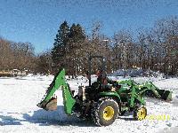 Cleaning off the pond at the Mud Hole 2011